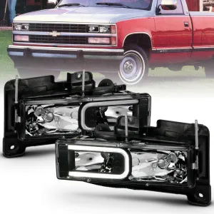 ANZO 1999-2000 Cadillac Escalade Crystal Headlights Light Bar Black Housing (Pair)
