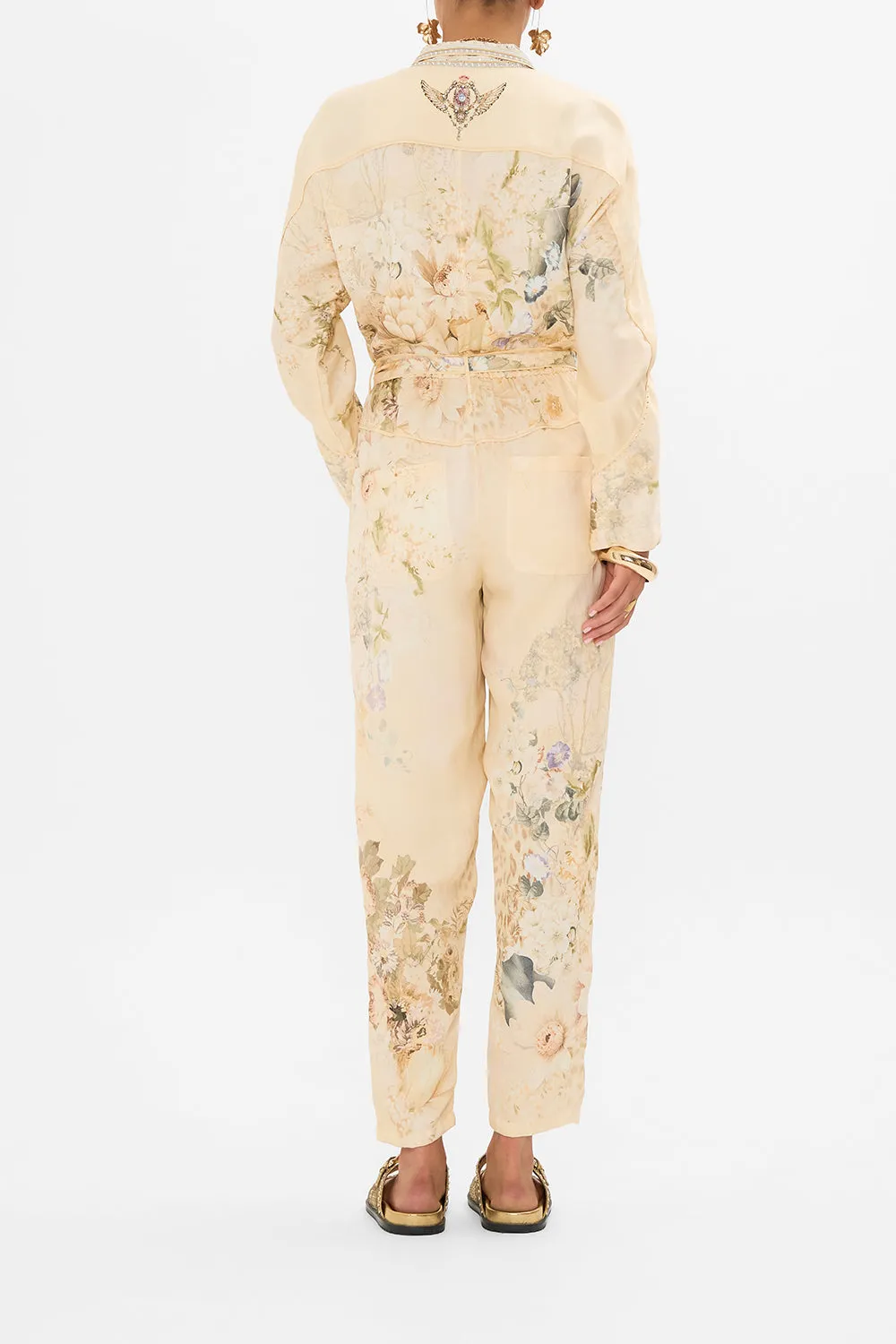 ZIP FRONT PANEL JUMPSUIT ADORNED IN ANTIQUITY